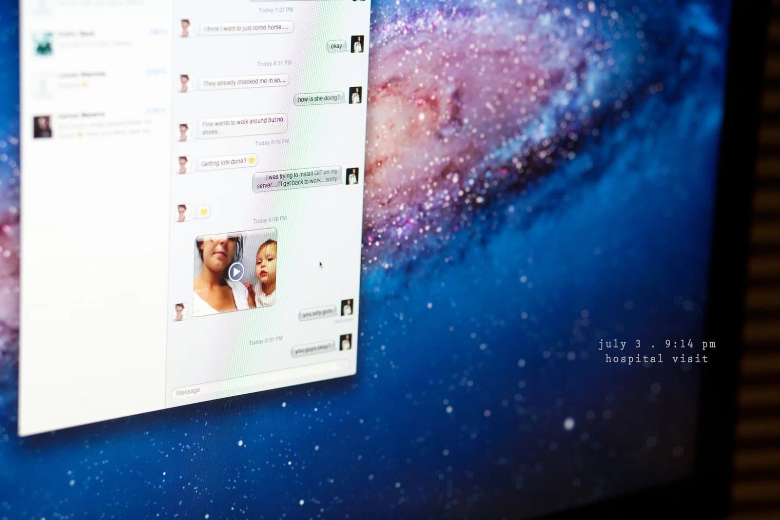 A computer screen shows a chat window and a photo of a baby, captioned hospital visit.