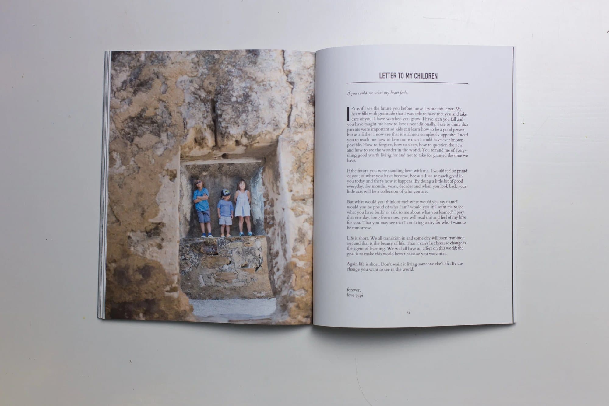 Printed 2015 issue open to three children in a stone window beside the Letter to My Children article.