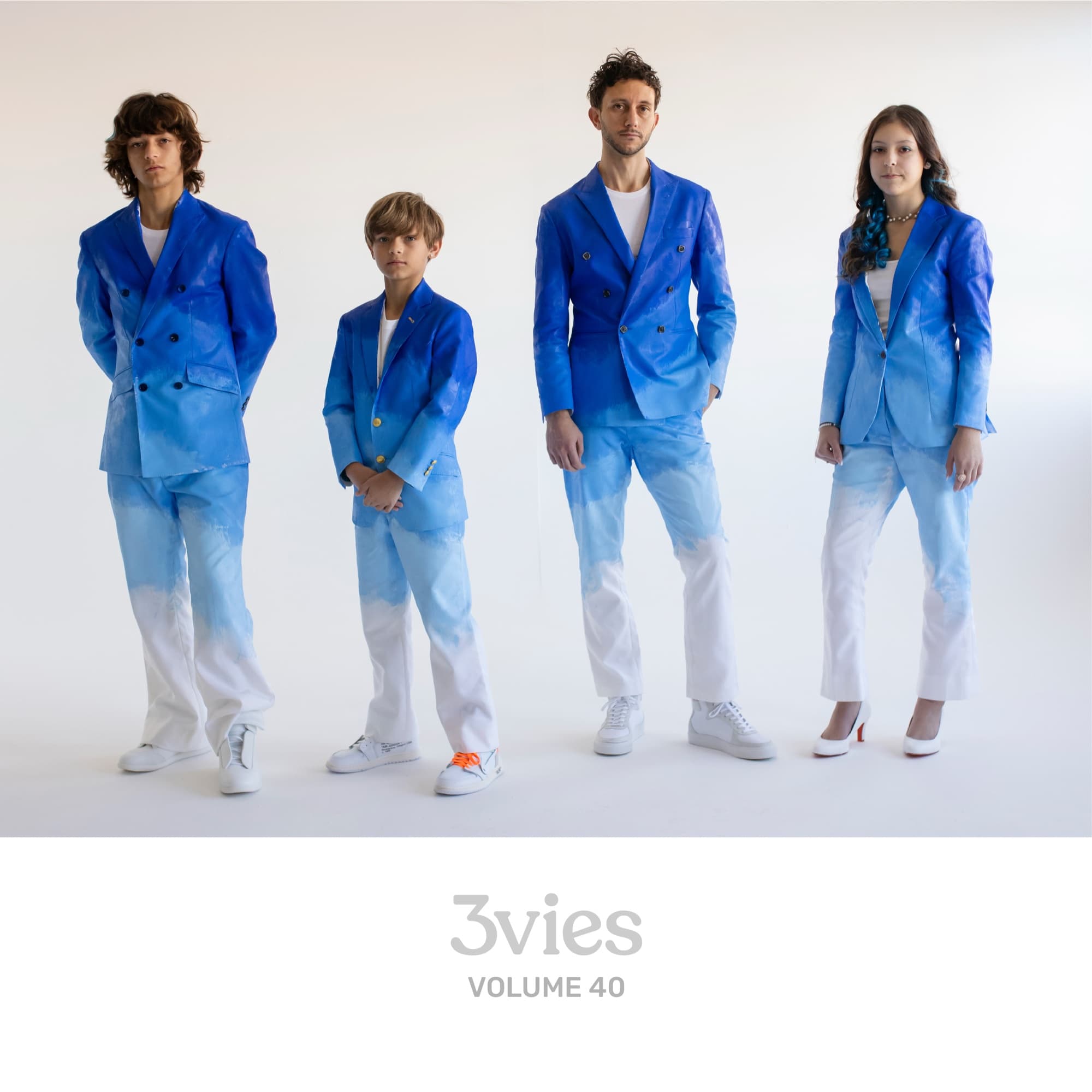 Spotify playlist cover for 3vies Volume 40, featuring Mark and his three children in blue ombre suits.