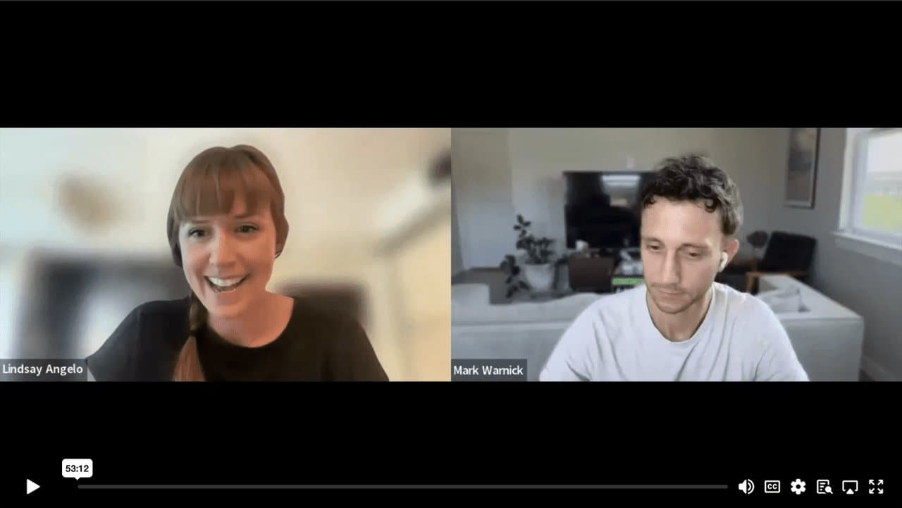Video still of Mark Warnick in conversation with Lindsay Angelo
