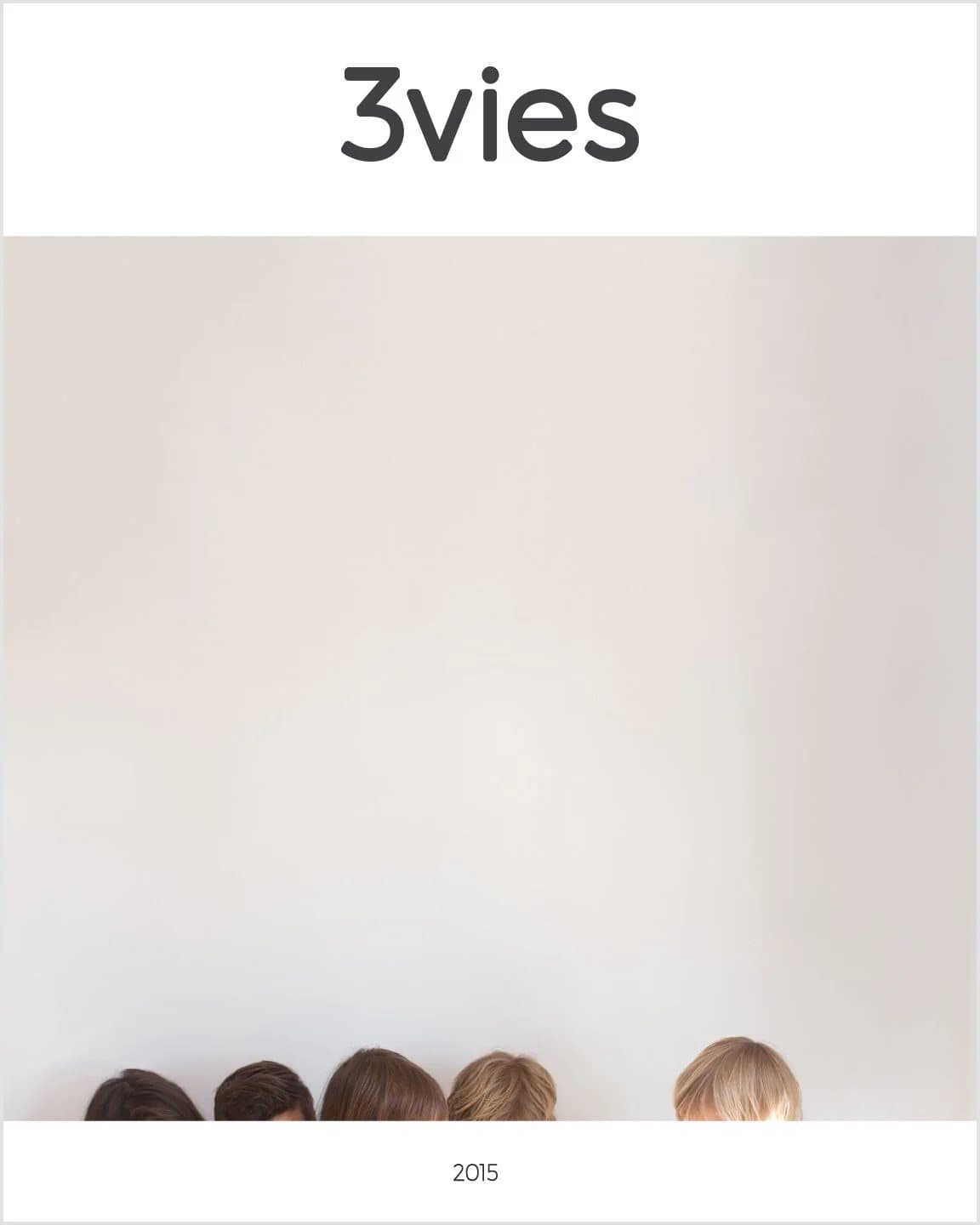 Original 3vies Volume 30 cover, dated 2015, with a row of family heads along the bottom edge.
